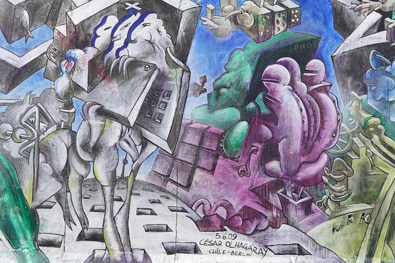 Graffiti on the Berlin Wall in the East Side Gallery, Berlin, Germany, Europe, Abstract art with surreal figures and shapes, mottled colours and an enigmatic composition of geometric elements on a wall, East Side Gallery, Warschauer Strasse, Europe