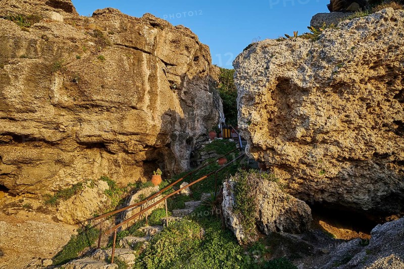 Rock chapel, Archangel Michael Panormitits, A stony footpath leads through a rocky landscape in daylight, Old Town of Rhodes, Rhodes Town, Rhodes, Dodecanese, Greek Islands, Greece, Europe