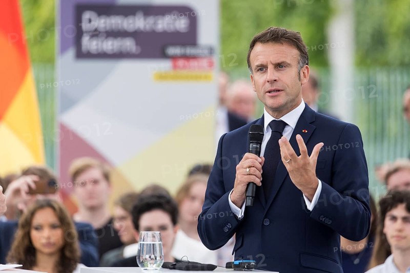 Emmanuel Macron (President of the French Republic) at the stage talk in the dialogue forum at Demokratie feiern. / The Basic Law turns 75, together it will be a celebration, Berlin, 26 May 2024