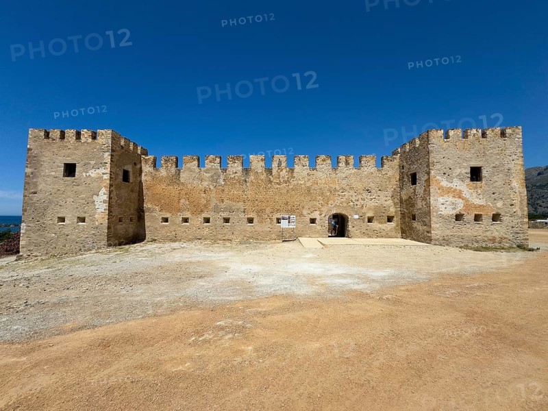 Exterior view with two corner towers walls battlements entrance of Fort Fortezza Fortetza Frangokastello built by Republic of Venice in 14th century Venetian fort, Frangokastello, Sfakia, Crete, Greece, Europe
