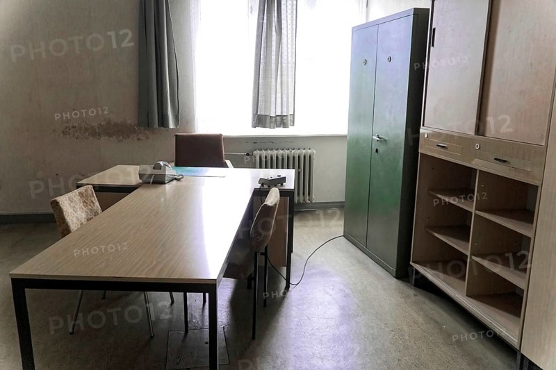 An office with simple furniture, desk, chairs, filing cabinet and a window, Berlin-Hohenschoenhausen Memorial, former headquarters, Stasi remand centre, Berlin, Germany, Europe