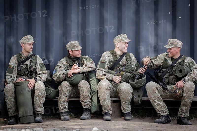 Young Lithuanian reserve soldiers take a lunch break during their training, taken in Rudninkai, 28/05/2024