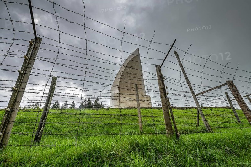 Barbed wire, memorial in the shape of a flame, Struthof concentration camp, Natzweiler, Alsace, France, Europe