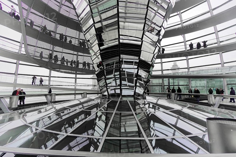 The dome of the Reichstag in Berlin. The architect Sir Norman Foster designed the steel and glass structure. Berlin, Berlin, Germany, Europe, Modern interior design with glass elements, reflective surfaces and several levels for people to walk on, The dome of the Berlin Reichstag. Berlin, Europe