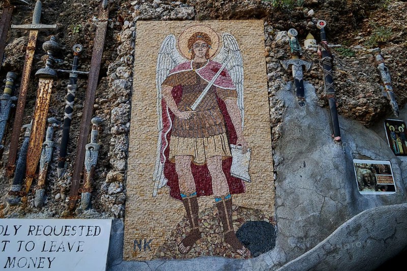 Rock Chapel, Archangel Michael Panormitits, A large mosaic of an angel with a sword, surrounded by crosses and religious symbols on a stone wall, Old Town of Rhodes, Rhodes Town, Rhodes, Dodecanese, Greek Islands, Greece, Europe