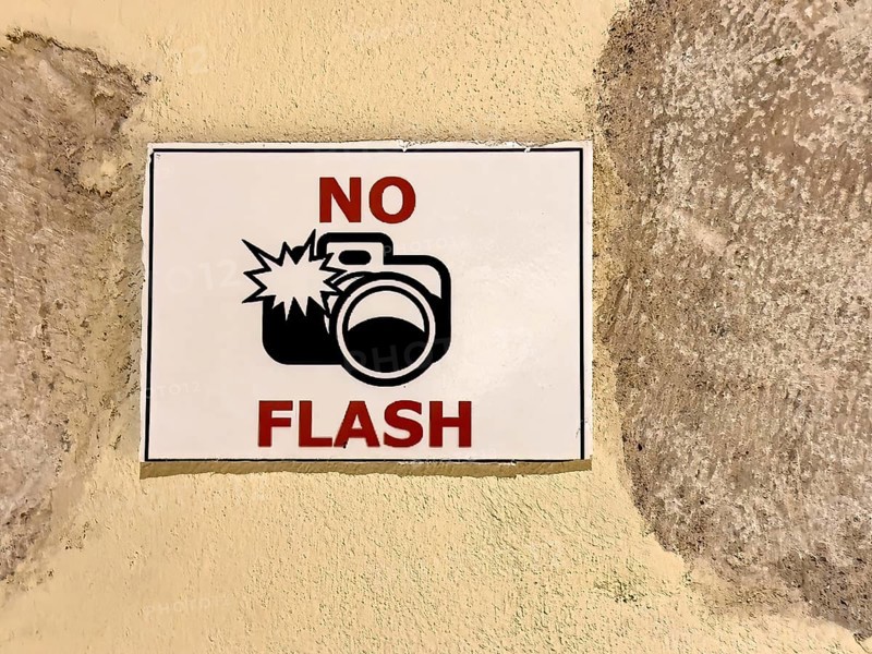Prohibition sign Notice photography with flash prohibited tourist information in museum of UNESCO World Heritage Orthodox Monastery of Moni Arkadi Arkadi Monastery from early Middle Ages, important national monument national shrine on the island of Crete, Arkadi, Armnatos, Crete, Greece, Europe
