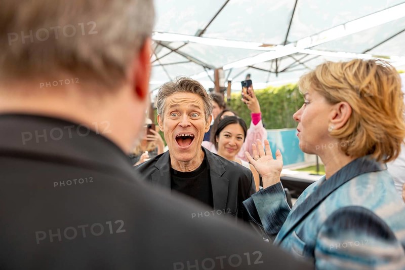 Cannes, France, 19.5.2024: Willem Dafoe and Sharon Waxman in front of talking about the new film Kinds of Kindness at The WRAP Conversations at Armani Caffe, 19.05.2024, Europe
