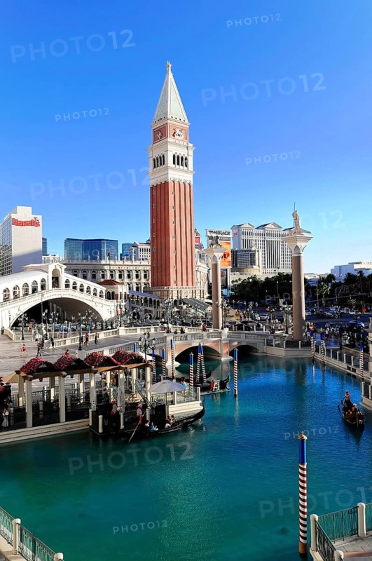 Las Vegas, Nevada, USA, North America, Beautiful urban scene with imposing buildings, a striking clock tower, canal and bridges, Las Vegas Strip, North America