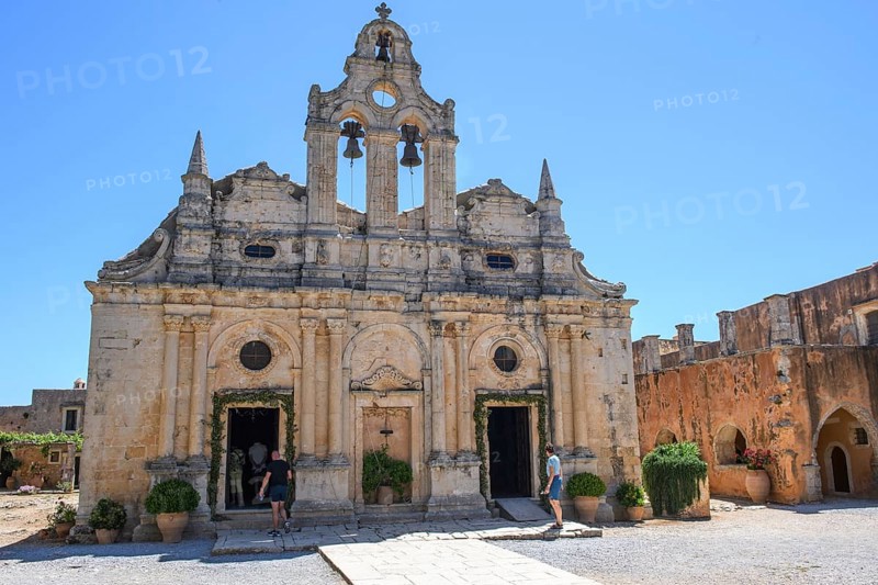 Facade with two doors Tor tor portals bells of two-aisled church built 1587 to 1600 in Arkadi Monastery today UNESCO World Heritage Site Orthodox Monastery of Moni Arkadi Arkadi Monastery from early Middle Ages, important national monument National Shrine on Crete Island, Arkadi, Armnatos, Crete, Greece, Europe