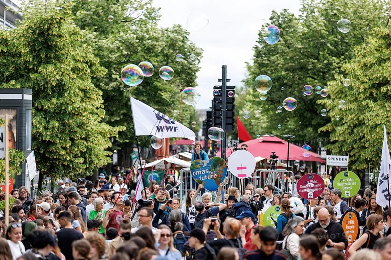 Demonstrators with signs at Fridays for Future, taken during the climate strike for the EU elections in Berlin, 31/05/2024