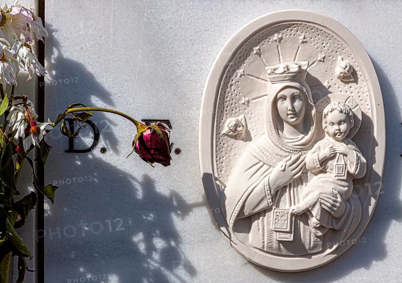 Religious symbols on the graves in a cemetery in Chiclana, Andalusia, Spain, Europe