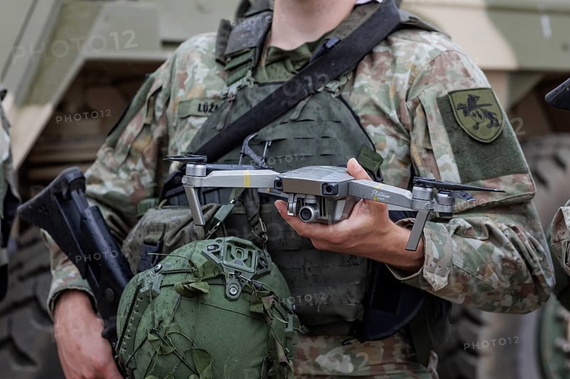 A Lithuanian army drone pilot holds a reconnaissance drone, taken during the NATO Steadfast Defender large-scale manoeuvre and the German part of the exercise, Quadriga 2024, in Pabrade, 29.05.2024