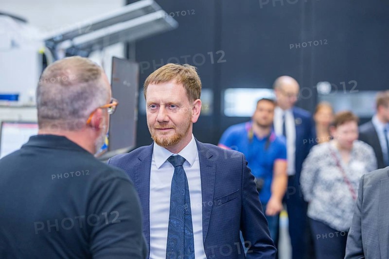 Minister President Michael Kretschmer visited TRUMPF Sachsen SE in Neukirch. After being welcomed by Dr Nicola Leibinger-Kammueller, CEO of TRUMPF SE + Co KG, and Dr Mathias Kammueller, CDO of TRUMPF SE + Co KG, the Minister-President talked to those present and took part in a tour of the company. The company is one of the international market and technology leaders in the field of machine tools and lasers for industrial production, Neukirch/Lausitz, Saxony, Germany, Europe