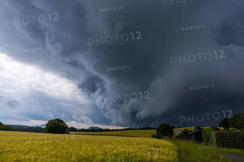 A thunderstorm cell moves over Porschdorf in Saxon Switzerland, thunderstorm, Porschdorf, Saxony, Germany, Europe