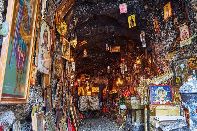 Rock Chapel, Archangel Michael Panormitits, A cave full of Orthodox icons and paintings, illuminated by warm candles, with a religious and spiritual atmosphere, Rhodes Old Town, Rhodes Town, Rhodes, Dodecanese, Greek Islands, Greece, Europe