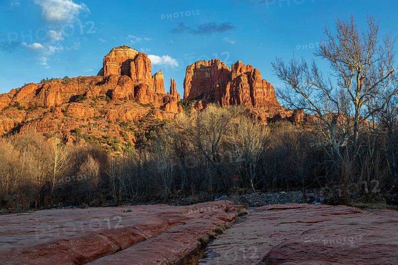 Cathedral Rock sandstone formations tower over Oak Creek at the Crescent Moon Picnic Site in Sedona, Arizona, USA, North America