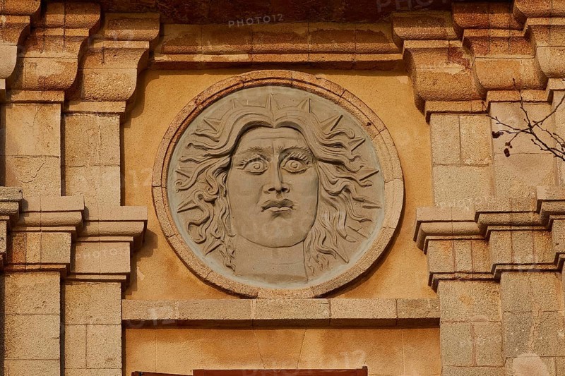 Sun god Helios, A relief of a sun face carved in stone on a historic building, Old Town of Rhodes, Rhodes Town, Rhodes, Dodecanese, Greek Islands, Greece, Europe