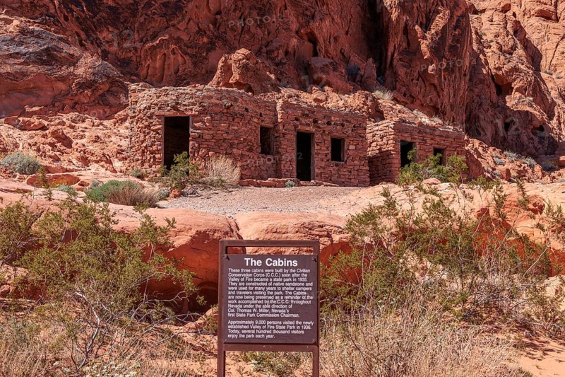Sign tells the history of The Cabins built by the Civilian Conservation Corps in the 1930s at Valley of Fire State Park near Overton, Nevada, United States of America, USA, North America