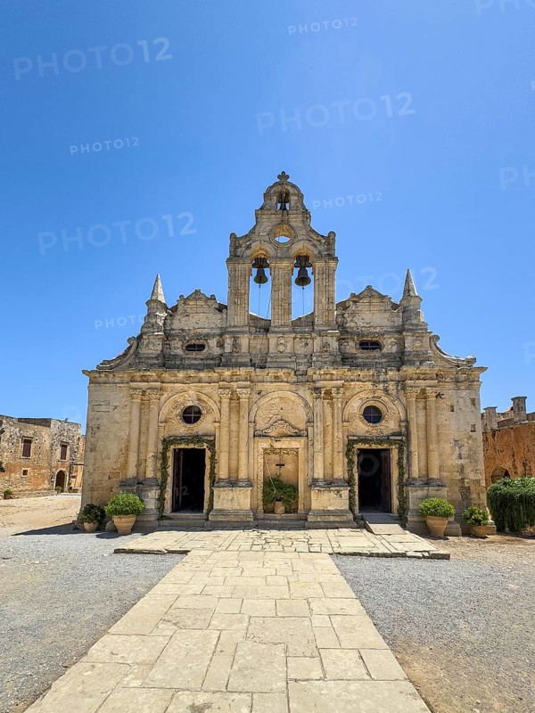 Front view of facade church monastery church Transfiguration church dedicated to Saints Constantine and Helen and Transfiguration Christ the Saviour built from 1587 to 1600 in historic monastery Arkadi today UNESCO World Heritage Site orthodox monastery Moni Arkadi Arkadi monastery from early Middle Ages, important national monument national shrine on Crete island, Arkadi, Armnatos, Crete, Greece, Europe