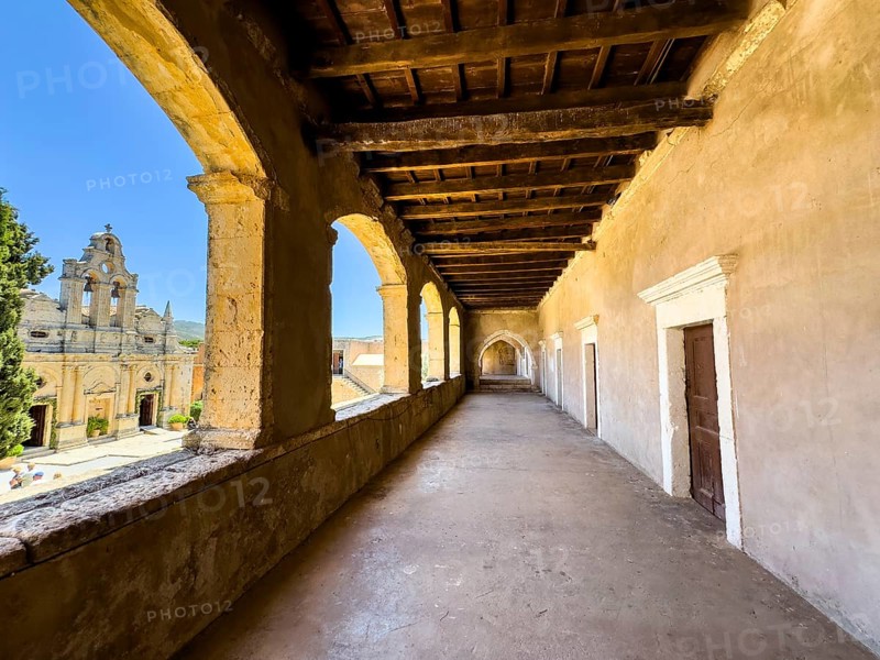 Upper archway in 1870 on the site of the western gate destroyed during the siege of the Ottoman Empire, on the left at the edge of the picture facade of the monastery church, UNESCO World Heritage Site historic Orthodox monastery Moni Arkadi Arkadi monastery from the early Middle Ages, important national monument national shrine on the island of Crete, Arkadi, Armnatos, Crete, Greece, Europe