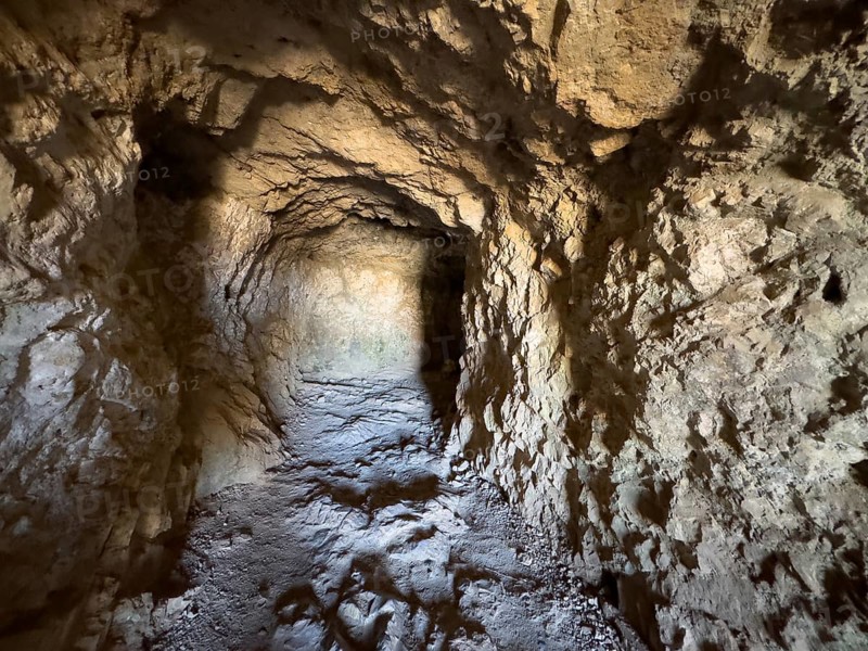 Cave with rock-cut passageway on the site of the historic fortress Fortetza Fortezza of Rethymno built by the Republic of Venice in the 16th century in the north-west of the old town of Rethymno on the rocky hill of Paleokastro on the north coast of Crete, Rethymno, Crete, Greece, Europe