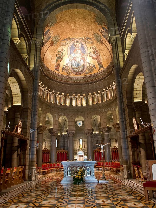 Sacred church interior with mosaic, arches and festively decorated altar, Monte Carlo, Monaco, Europe