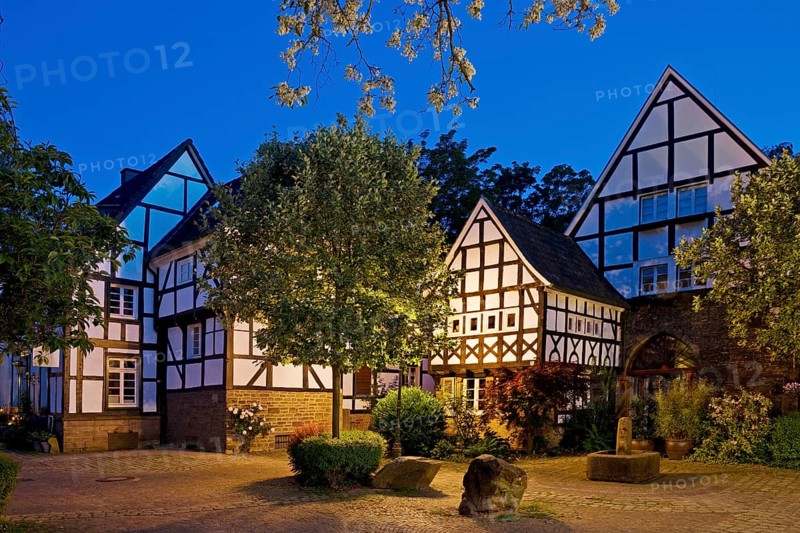 Five-gabled corner, architectural monument in the evening, half-timbered houses in the Freiheit Alt Wetter, Wetter (Ruhr), Ruhr area, North Rhine-Westphalia, Germany, Europe