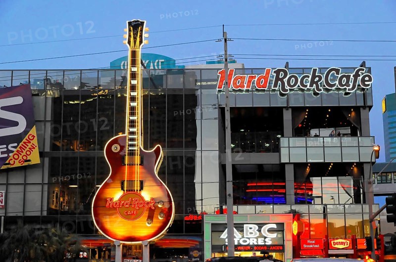Las Vegas, Nevada, USA, North America, Large illuminated guitar in front of the Hard Rock Cafe in Las Vegas at night, Las Vegas Strip, North America