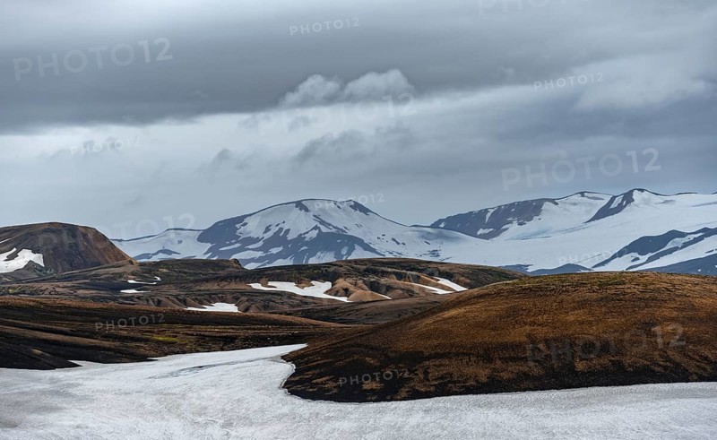 Volcanic landscape with hills and snow, Laugavegur trekking trail, Landmannalaugar, Fjallabak Nature Reserve, Icelandic Highlands, Sudurland, Iceland, Europe