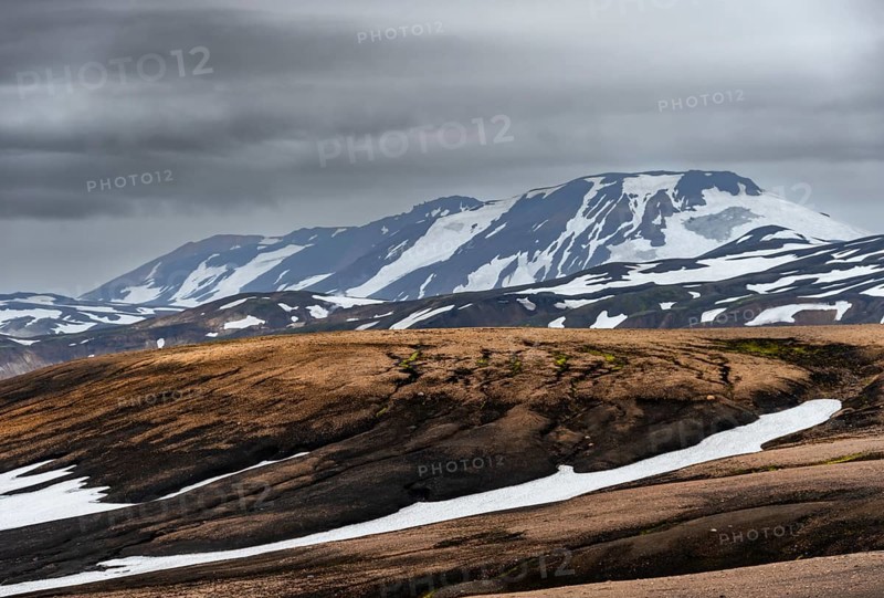 Volcanic landscape with hills and snow, Laugavegur trekking trail, Landmannalaugar, Fjallabak Nature Reserve, Icelandic Highlands, Sudurland, Iceland, Europe