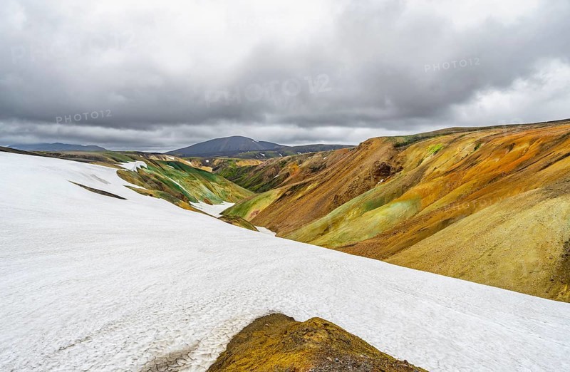 Colourful volcanic landscape with hills and snow, Laugavegur trekking trail, Landmannalaugar, Fjallabak Nature Reserve, Icelandic Highlands, Sudurland, Iceland, Europe
