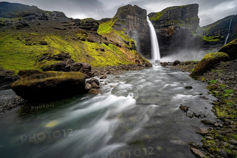Haifoss and Granni waterfall at a canyon, Fossá í Thjórsárdal, with river í Thjórsárdal, long exposure, dramatic landscape, Hekla, Iceland, Europe