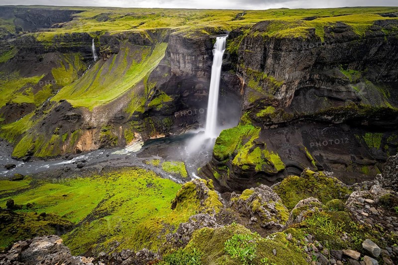 River and waterfalls at a canyon with green moss, Haifoss and Granni waterfall at a canyon, Fossá í Thjórsárdal, with river í Thjórsárdal, long exposure, dramatic landscape, Hekla, Iceland, Europe