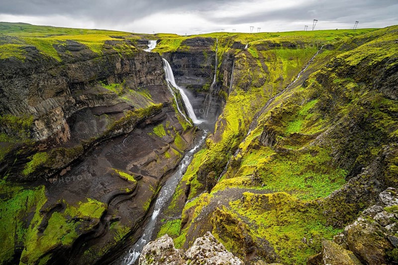 River and waterfalls at a canyon with green moss, Haifoss and Granni waterfall at a canyon, Fossá í Thjórsárdal, with river í Thjórsárdal, long exposure, dramatic landscape, Hekla, Iceland, Europe