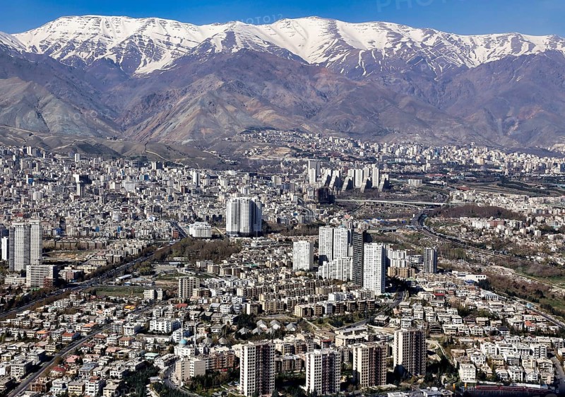 View of the metropolis of Tehran with snow-capped mountains in the background, 25/03/2013, Tehran, Iran, Asia