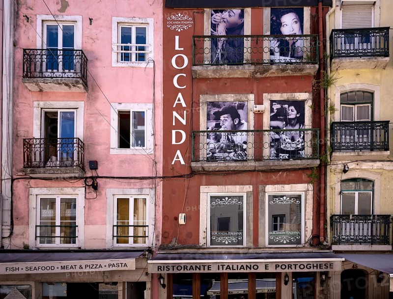 Italian restaurant Locanda, house facade with large photos of Italian film stars with spaghetti, Sophia Loren, old town, Lisbon, Portugal, Europe