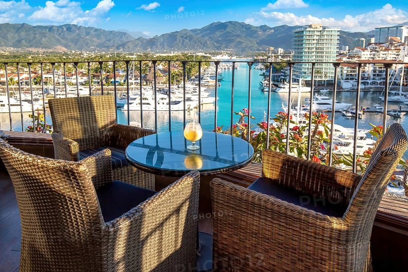 Mexico, Puerto Vallarta El Faro lighthouse with panoramic view of marina from restaurant on top, Central America