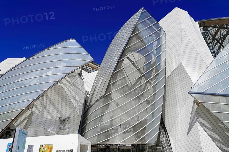 Fondation Louis Vuitton, private museum of modern art, architect Frank Gehry, Bois de Bologne, Paris, Île de France, France, Europe, Modern architecture with extraordinary glass and metal design, representing artistic and futuristic elements, Europe