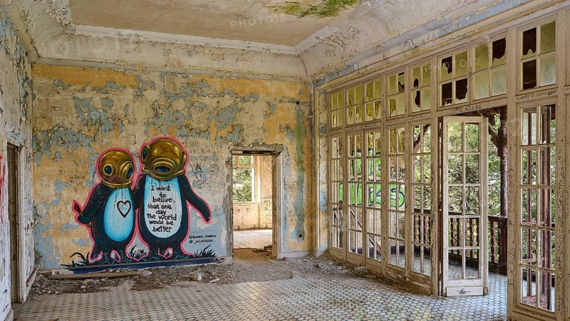 Abandoned room with graffiti on the wall, tiled floor and nature view through the windows, Mussolini Villa, Villa de Vecchi, Profitis Ilias, Empona, Rhodes, Dodecanese, Greek Islands, Greece, Europe