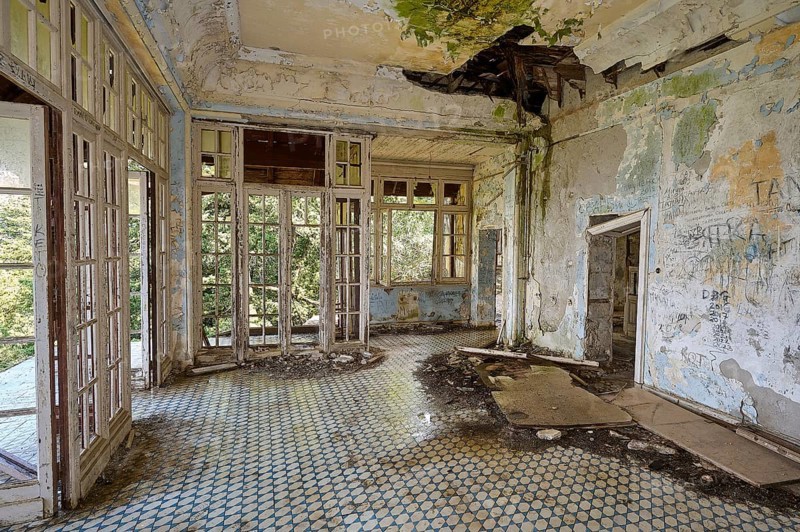 Dilapidated room with broken roof, damaged walls and graffiti, flooded with light, Mussolini Villa, Villa de Vecchi, Profitis Ilias, Empona, Rhodes, Dodecanese, Greek Islands, Greece, Europe