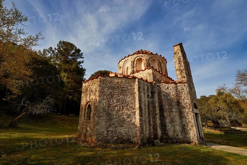 Historic church with stone façade in a rural landscape under a blue sky, Byzantine chapel Agios Nikolaos Foundoukli, between Eleousa and Profitis Ilias, Rhodes, Dodecanese, Greek Islands, Greece, Europe