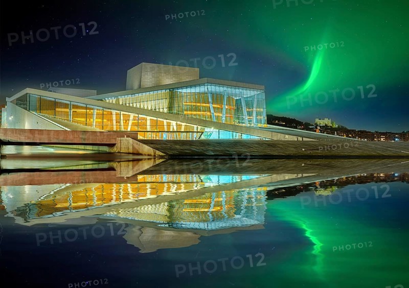 Opera illuminated night northern lights reflection Oslo Norway