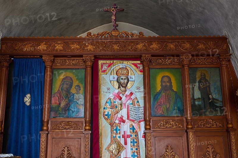 Interior with richly decorated iconostasis and religious images of saints, Kastro Monolithou, Chapel of Agios Panteleimon, Monolithos Castle, rock castle, Monolithos village, Rhodes, Dodecanese, Greek Islands, Greece, Europe