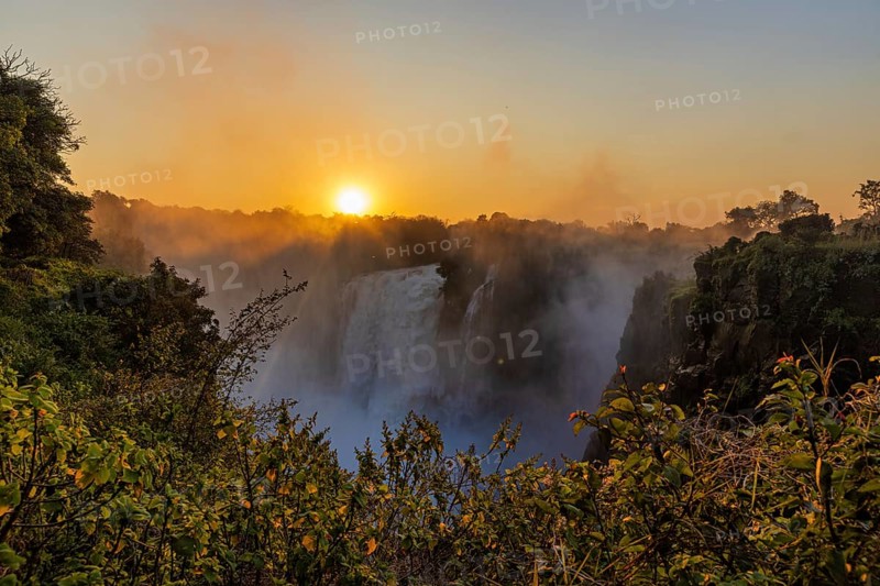 Sunset at Victoria Falls with high waters in June