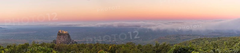 Taung Kalat Monastery seen from Mt. Popa Resort in Myanmar at dusk