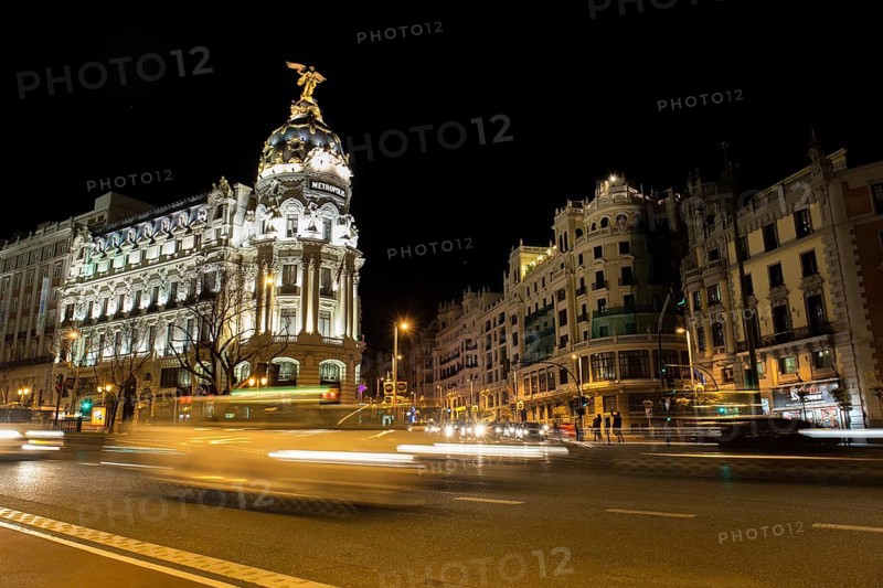 Alcala and Gran Via street in Madrid night city lights