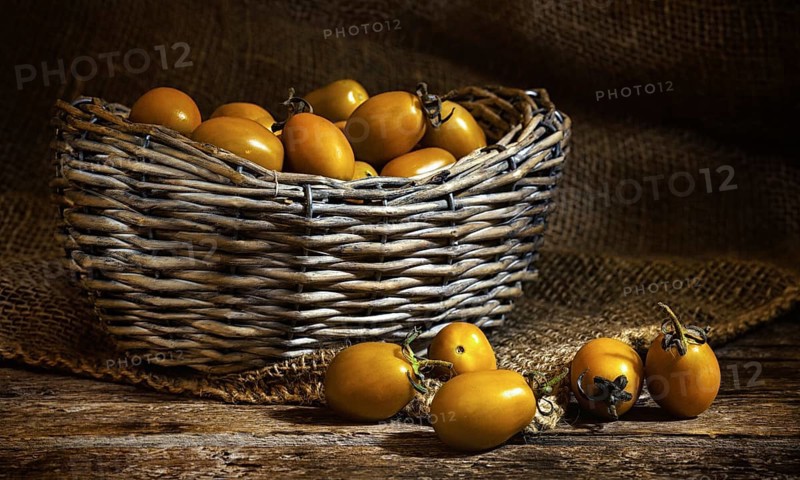 Varieties of yellow Heirloom cherry tomatoes called yellow pear and yellow datterino (or plum) cherry tomatoes