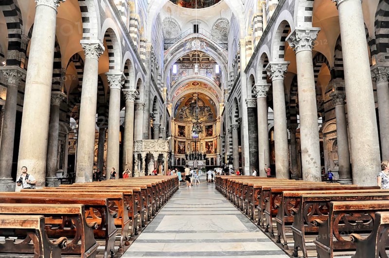 Interior, Cathedral of Santa Maria Assunta, Pisa, Tuscany, Italy, Europe, Interior of a Gothic church with long benches and detailed architecture, Europe