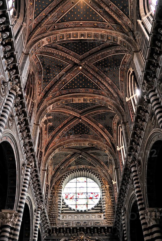 Siena Cathedral, Cattedrale di Santa Maria Assunta, UNESCO World Heritage Site, Siena, Tuscany, Italy, Europe, Gothic interior of a cathedral with ornate vaults and large window, Europe