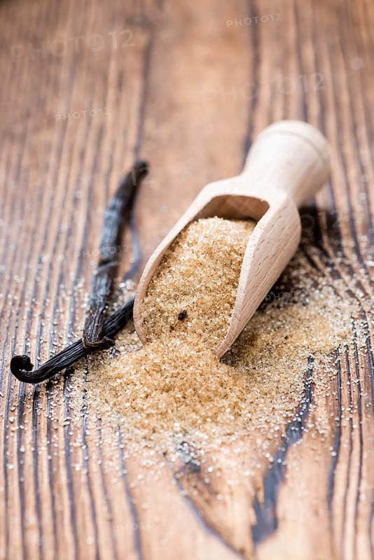 Portion of homemade Brown Vanilla Sugar (close-up shot)